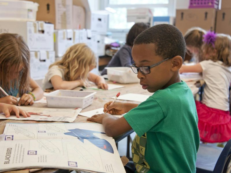 boy learning in classroom