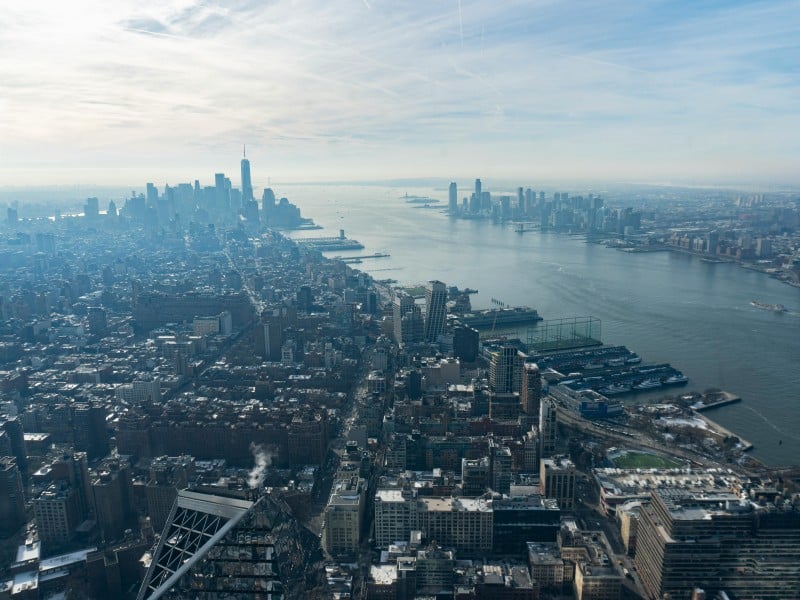 Aerial view of Manhattan looking south, with part of the Hudson River and New Jersey in view.