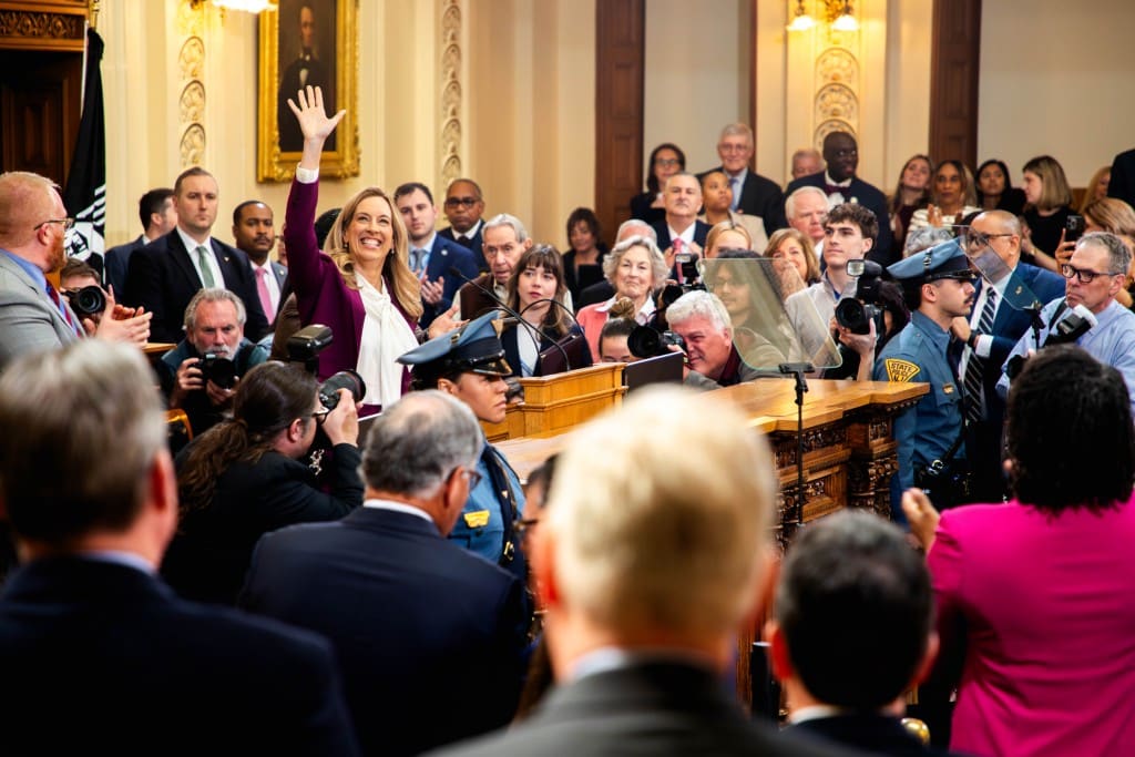 Mikie Sherrill waves in a crowd
