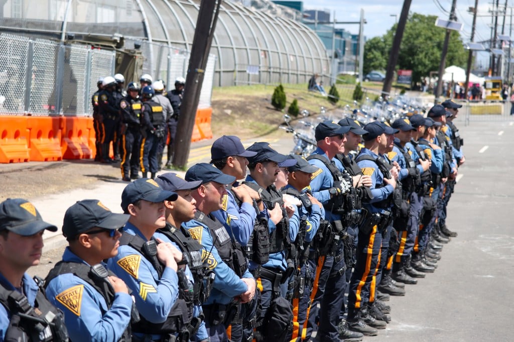 State police form a line on a street