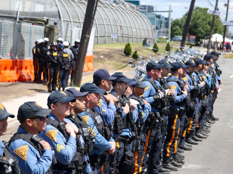 State police form a line on a street